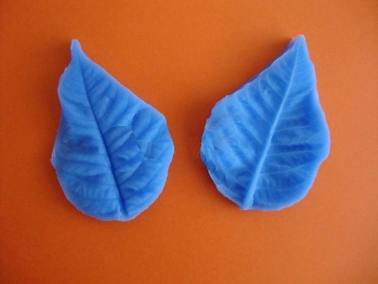 ⋗ Силіконовий вайнер Пелюсток пуансетії купити в Україні ➛ CakeShop.com.ua, фото